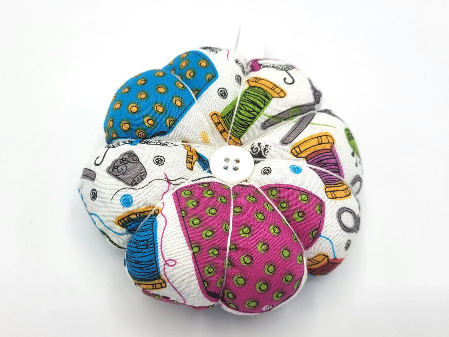 Small Wrist Pin Cushion, pumpkin shape with elastic wrist strap and adjustment clip