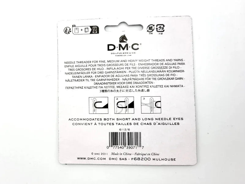 Back of a DMC needle case packaging with branding and product details.