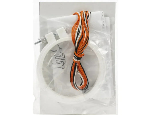 Packaged product with orange and black striped cord on a white background