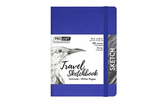 Blue travel sketchbook with a bird illustration on a white background