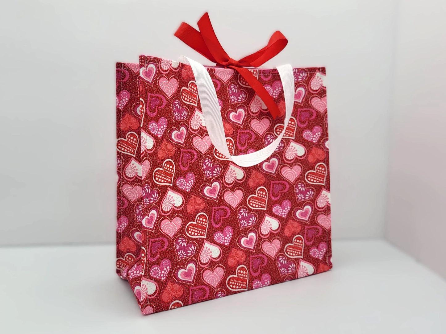 Small Reusable Fabric Valentine's Day Gift Bag with Ribbon tie and handles, Glitter Hearts