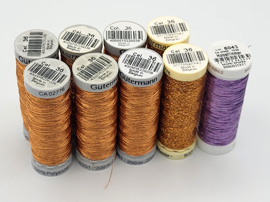 Metallic Thread lot, Gutermann and Sulky, 9 spools gold and holoshimmer