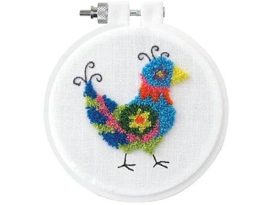 Embroidery hoop with colorful peacock design on a white background