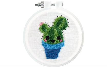 Embroidery hoop with a cactus design on a white background