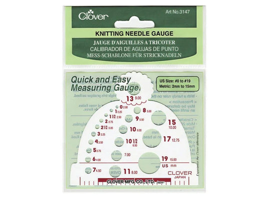 Knitting needle gauge with measurement scale on a white background