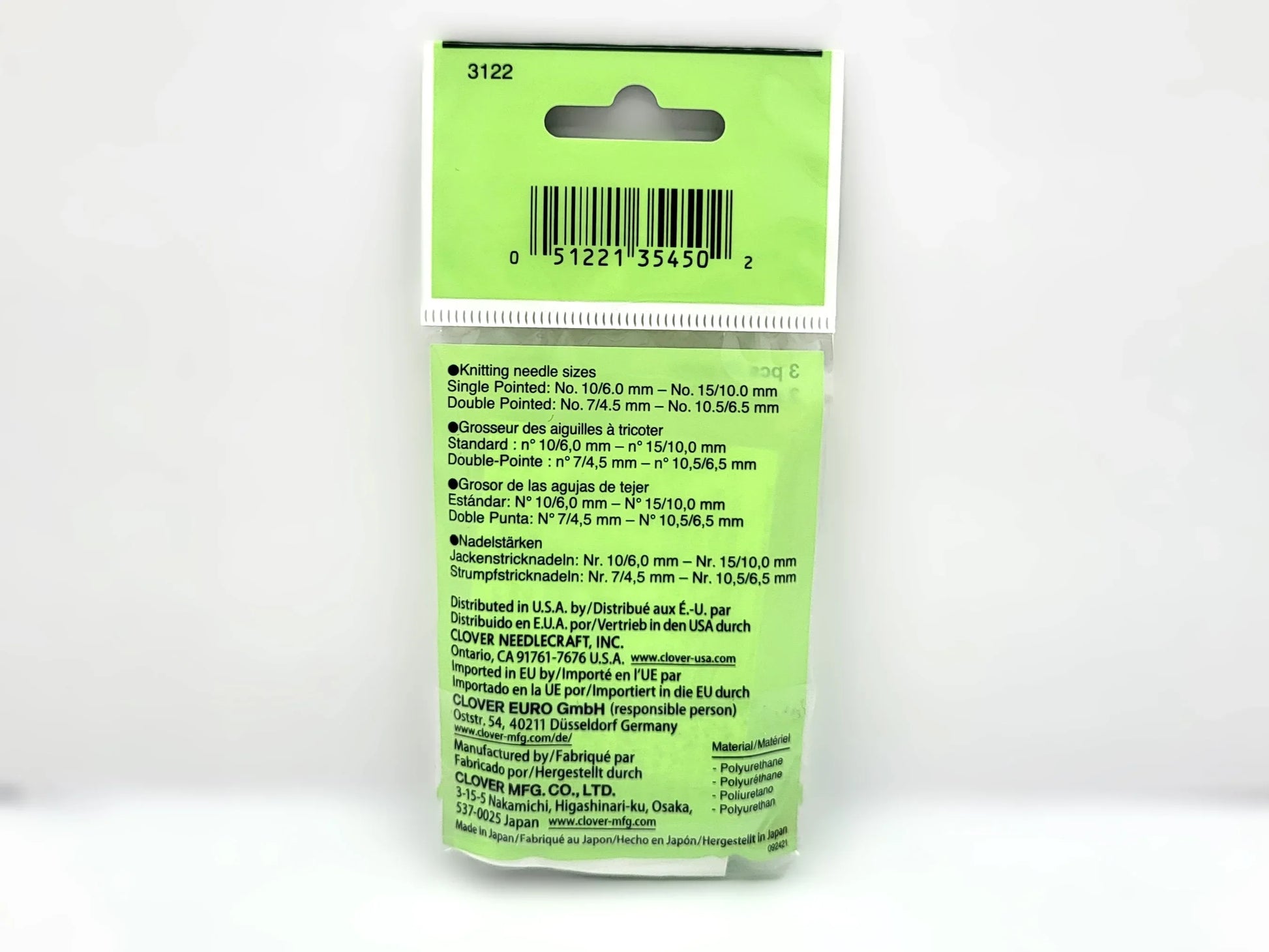 Green packaging with text and a barcode on a white background