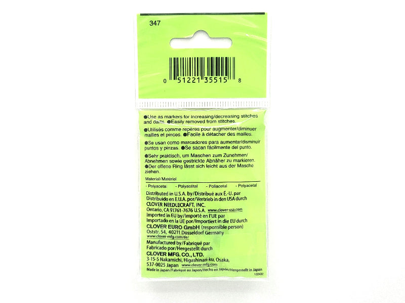 Green packaging with text and a barcode on a white background