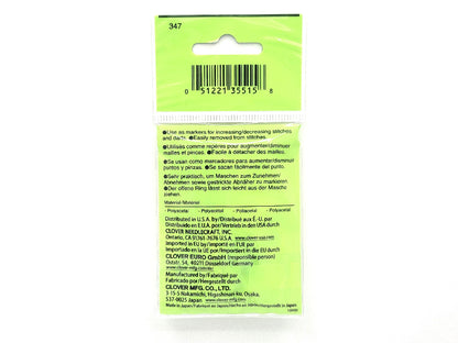 Green packaging with text and a barcode on a white background