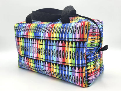 Crayon print zipper duffle bag, front view — colorful handmade craft notions bag