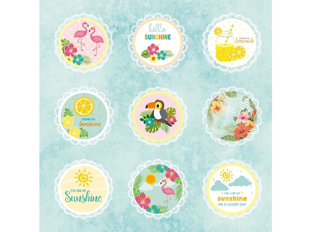 Set of decorative stickers with tropical designs on a light blue background