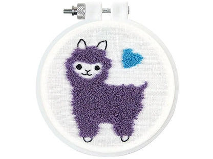 Embroidery hoop with a purple llama design on a white background