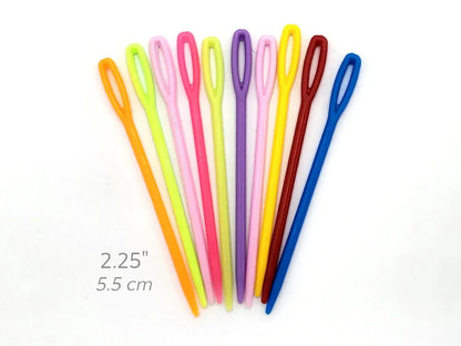 Set of colorful sewing needles on a white background with measurement text.