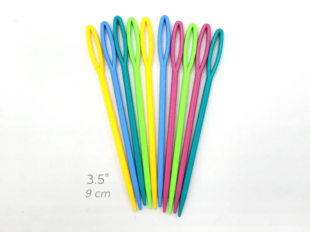 Set of colorful knitting needles on a white background with measurement text.