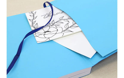 Floral card with blue ribbon on a blue envelope