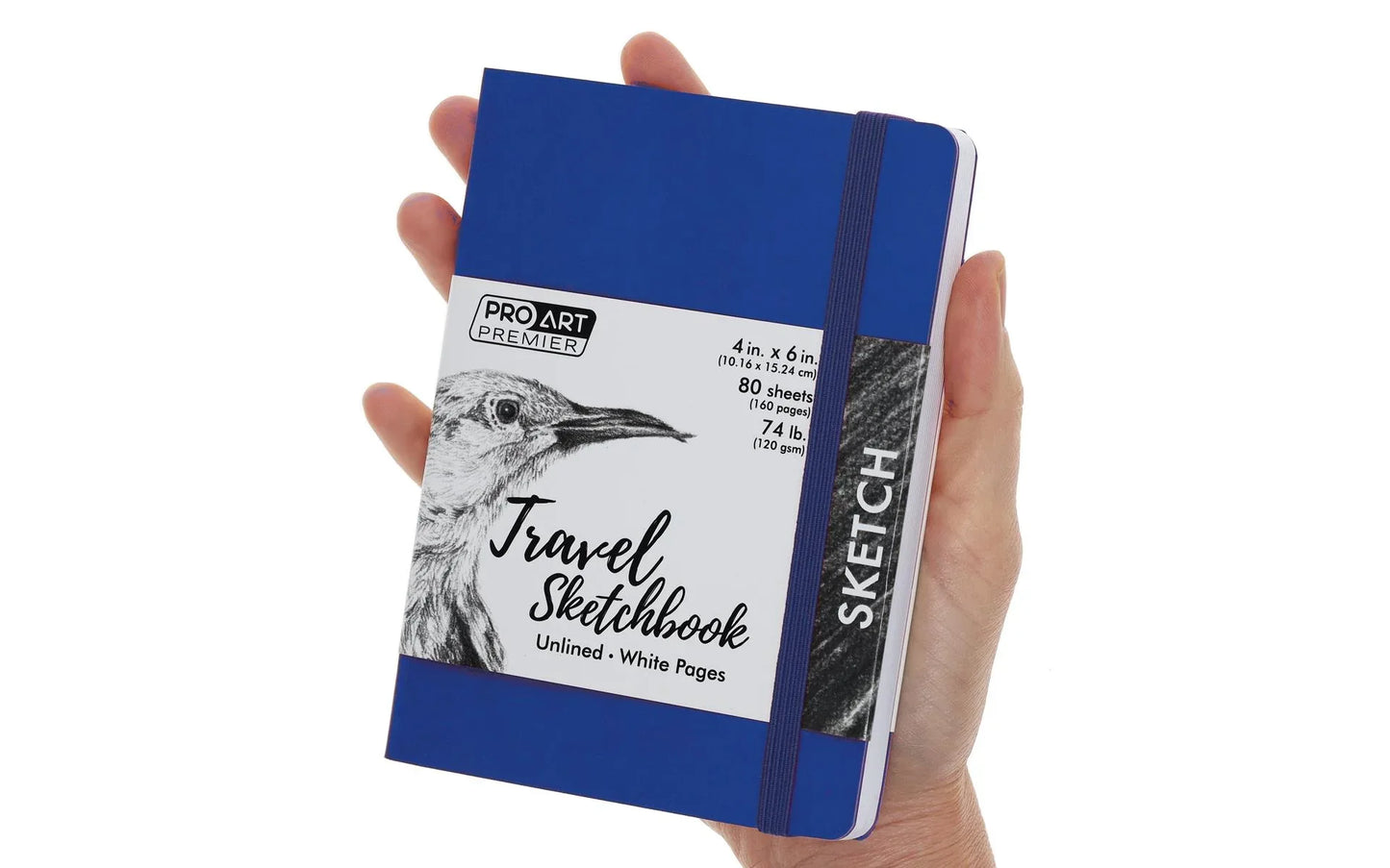 Blue travel sketchbook held in a hand with a white background