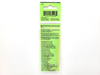 Clover needle packet with label on a white background