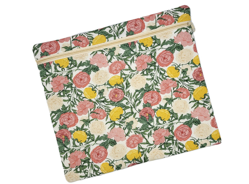 Floral patterned pouch with a zipper on a white background