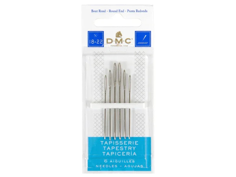 Pack of DMC tapestry needles in a clear plastic packaging on a white background