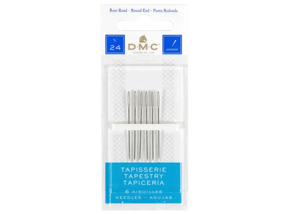 Pack of DMC tapestry needles on a white background