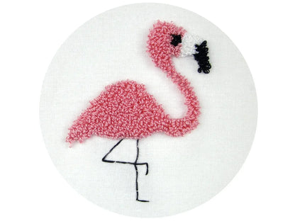 Pink flamingo plush toy on a white background