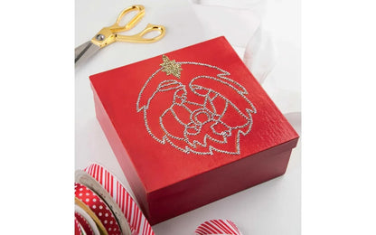 Red decorative box with a floral design on a white background