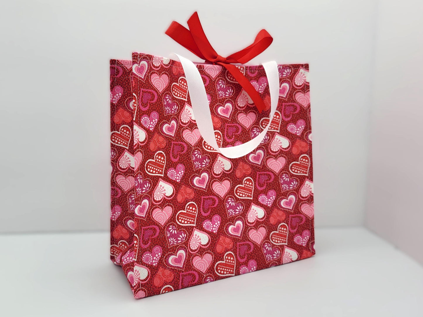 Small Reusable Fabric Valentine's Day Gift Bag with Ribbon tie and handles, Glitter Hearts