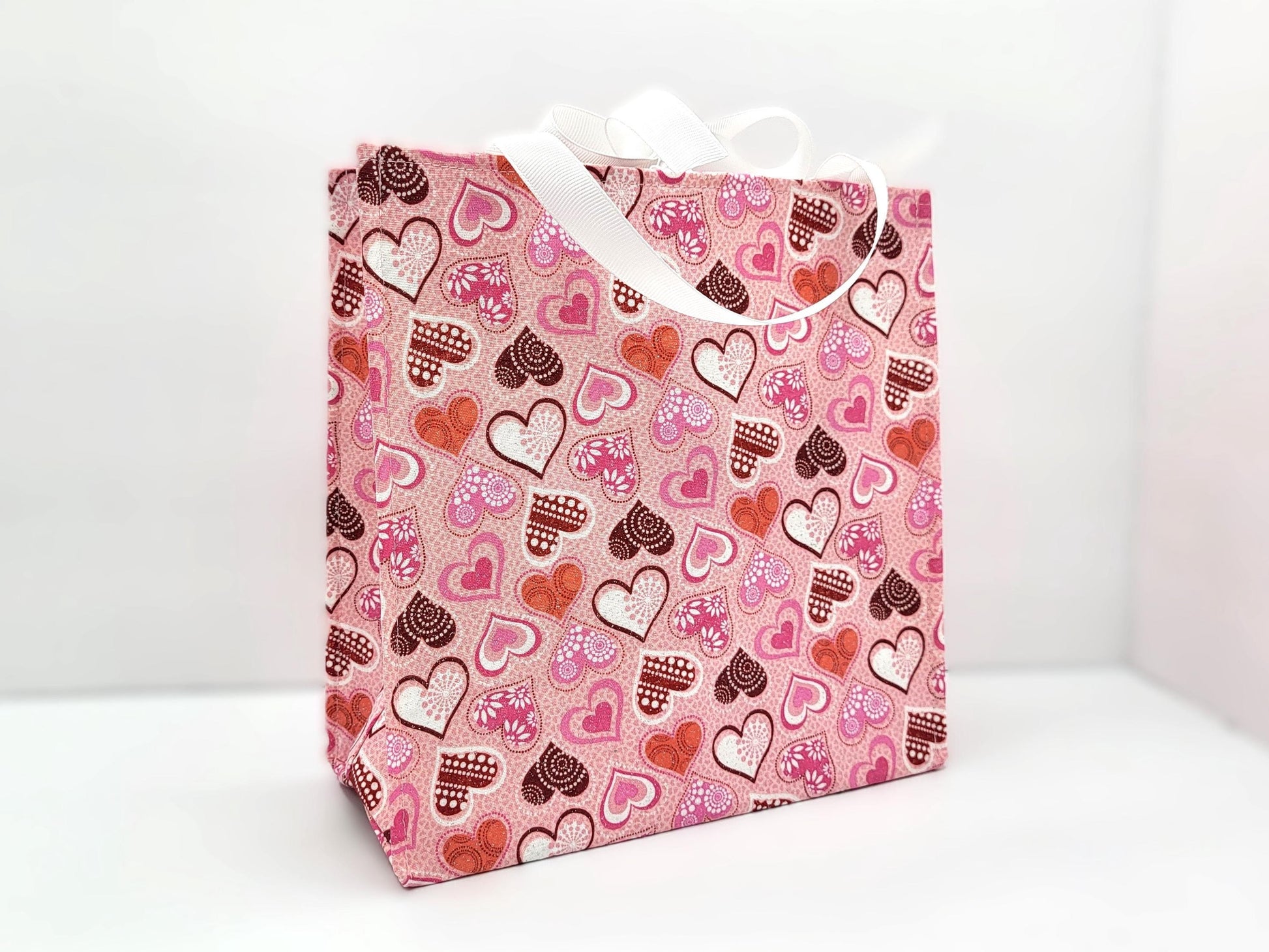 Small Reusable Fabric Valentine's Day Gift Bag with Ribbon tie and handles, Glitter Hearts, light