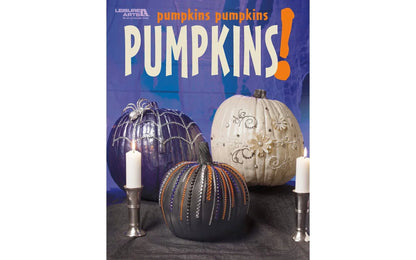 Decorative pumpkins with candles on a table, featuring a 'Pumpkins!' magazine cover.