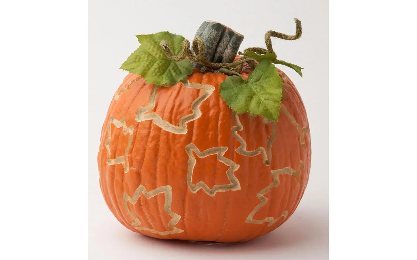 Decorative pumpkin with leaf stem on a white background