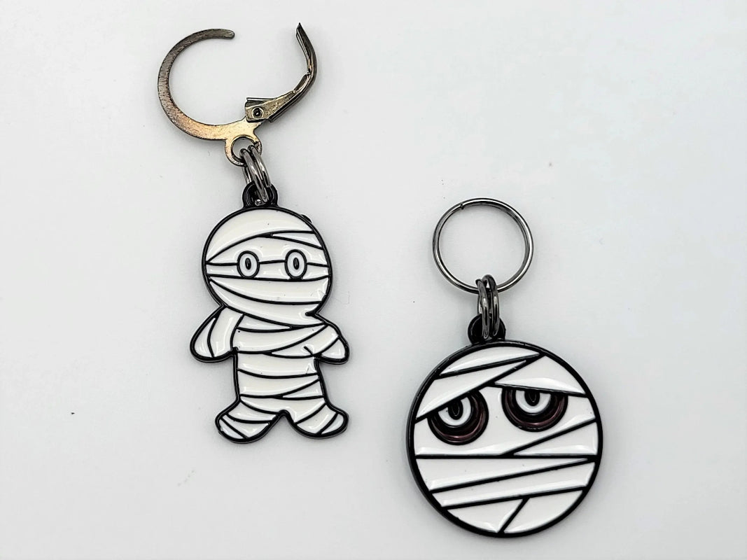 Halloween Mummy Stitch Markers 2pc set — both enamel charms included, flat lay